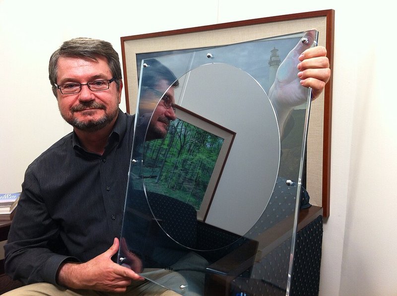 A 450mm silicon wafer shows the manufacturing precision needed for advanced semiconductors—one contamination speck can ruin millions of transistors. Credit: Wikimedia Commons